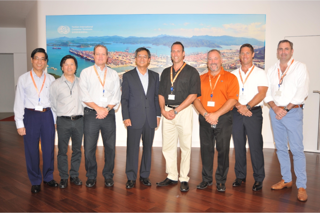 Photo caption:  Patrick Lam (fourth from left), Managing Director of YICT with Jeff Kellan (fourth from right), 
Vice President of Supply Chain Operations
