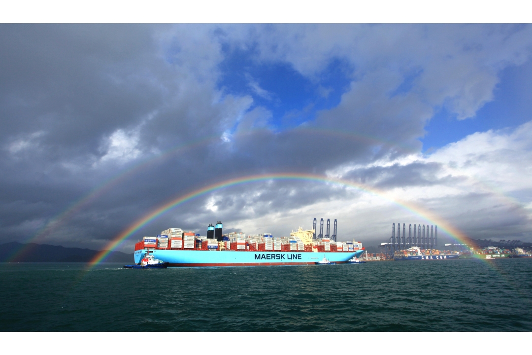 Under the rainbow, the Maersk Mc-Kinney Møller enters the Port of Yantian
