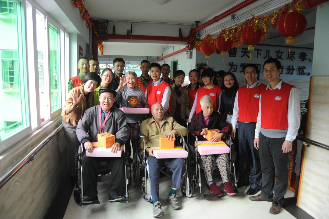 YICT staff with the elderly residents at the welfare centre
